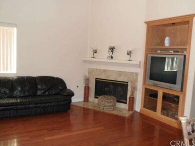 Family room with new wood flooring n Fireplace