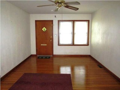 Spacious living room with gorgeous hardwood floors