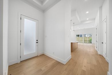 As you enter, you will notice spacious open concep