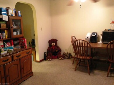 The other end of the kitchen is the dining area.