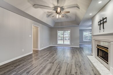 New flooring and paint in Living Room and Kitchen!