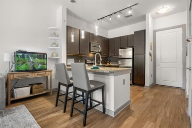 Kitchen with appliances with stainless steel fini