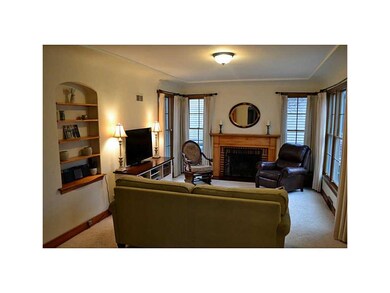 Living Room. Coved ceilings, wood-burning fireplac