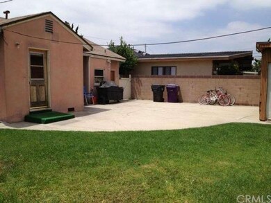 Great area for bikes and toys.  Block wall fence a