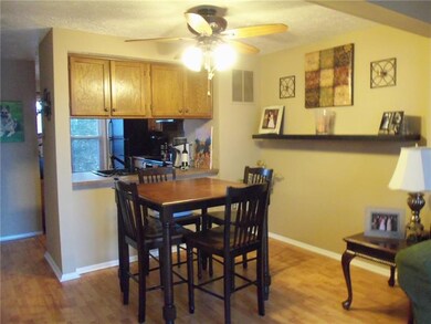 DINING AREA WITH PASS THROUGH TO KITCHEN