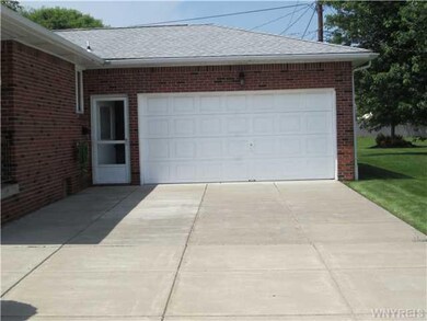 Garage Newer doublewide concrete driveway