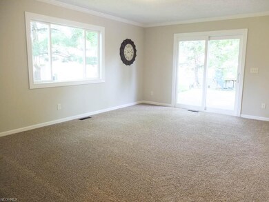 Family room with picture window and access to the 