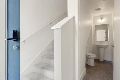Staircase featuring tile patterned floors