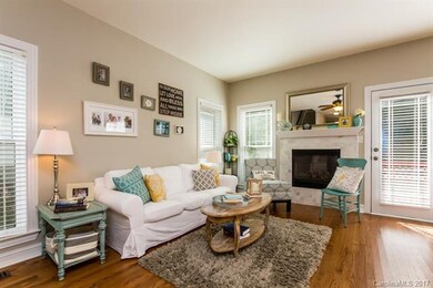 Gorgeous great room with newly updated marble fire