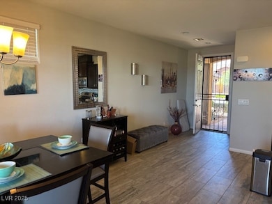 Foyer featuring wood finished floors and recessed lighting