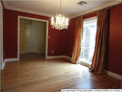 The over sized formal dining room features plenty 