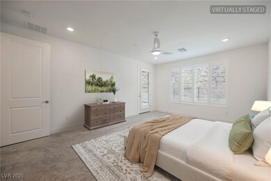 Virtually Staged Bedroom with access to exterior, light carpet, a ceiling fan, and recessed lighting