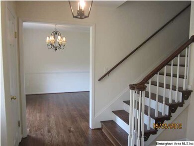 Entrance hall looking into dining room