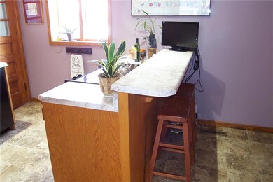 Raised breakfast counter seating in the kitchen!