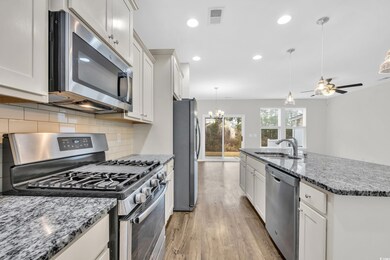 Kitchen featuring appliances with stainless steel 