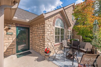 Entry, walled patio to right