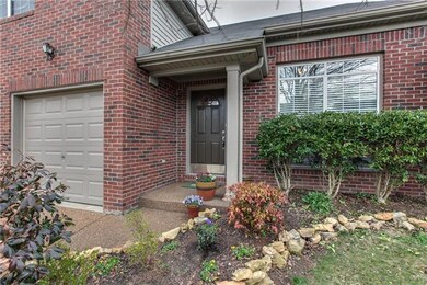 Covered front porch...where you can head out to the fitness center, pool, playgrounds, tennis courts and walking trail.