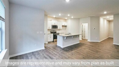 Open Concept - Kitchen Photos are for representative purposes only - actual home may vary