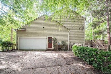 Circular driveway and side of garage