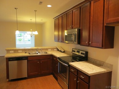 View of kitchen from laundry room doorway