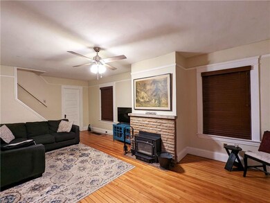 Expansive Living Room with Wood Burning Fireplace