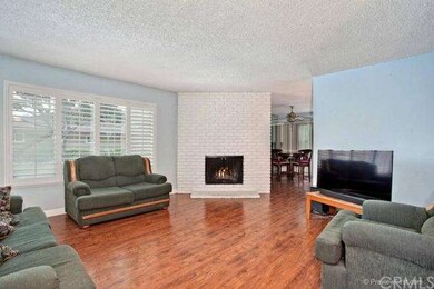 View of brick fireplace, dining room in the back g