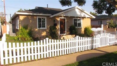 Front with White picket fence