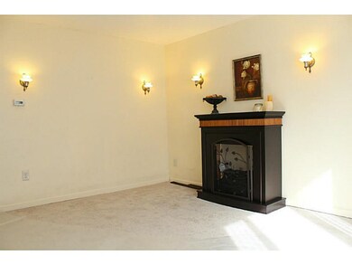 Living Room. New painting and carpeting throughout