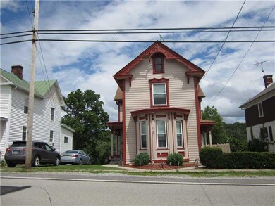 Exterior Front. View from street. Notice walk out 