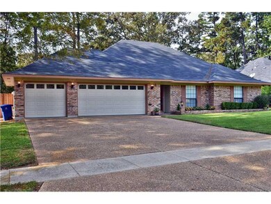 Facade/Exterior Front. New Garage Doors have been 
