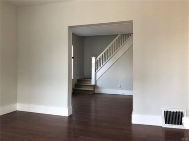 FRONT LIVING ROOM LOOKING TOWARDS 2ND LR