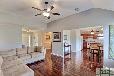 Great room looking into breakfast room and kitchen