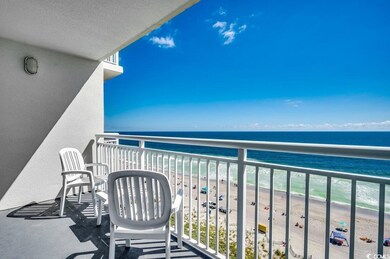 Balcony with a beach view and a water view