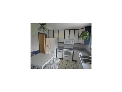 Kitchen. Large eat-in kitchen with newer white app