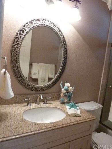 Vanity in second master bath.