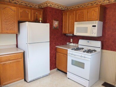 Kitchen comes fully applianced with gas range, ove