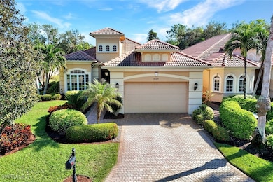 Single family exterior front of home with a garage