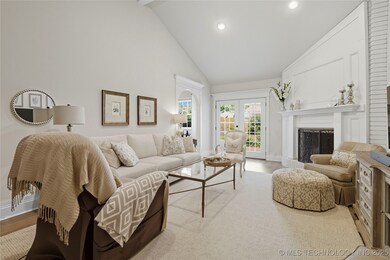 Family room w/ wood burning fireplace, atrium doors to park like backyard