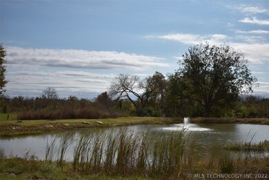 Community/Subdivision pond featuring water fountai