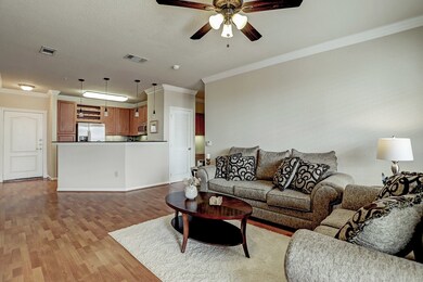 Living Area into Kitchen and Study Desk off to the