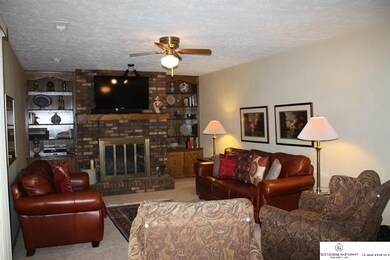 Beautiful fireplace and built ins for storage.