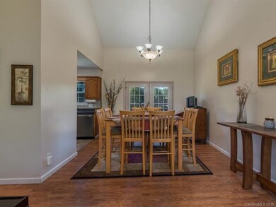 Bright dining area leading to back deck