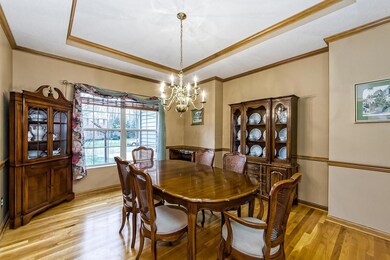 Formal Dining Room With Hardwood Floors
