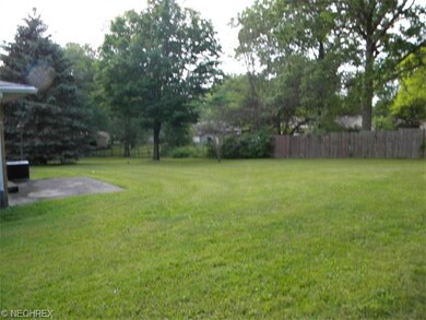 Large, rolling rear yard with lots of privacy.