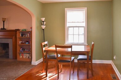The dining room has an extra wide archway to the l