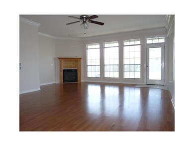 Living Room. This spacious living room includes a gas log fireplace.