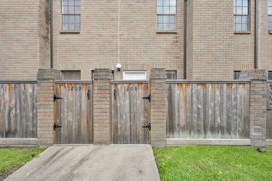 Private fence and brick siding.