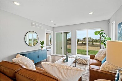 1402 Newport Ln, Raymore, MO 64083 - photo 5