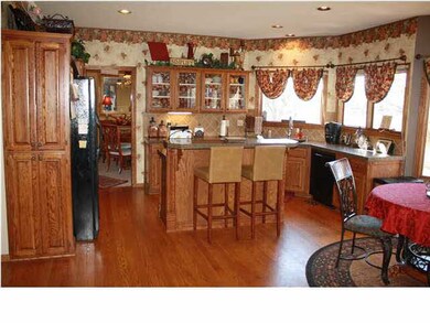 Home offers two fireplaces, newer carpet, newer ki