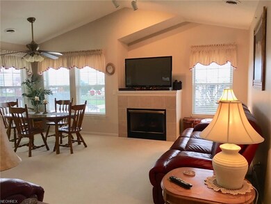 This elegant great room with a vaulted ceiling off